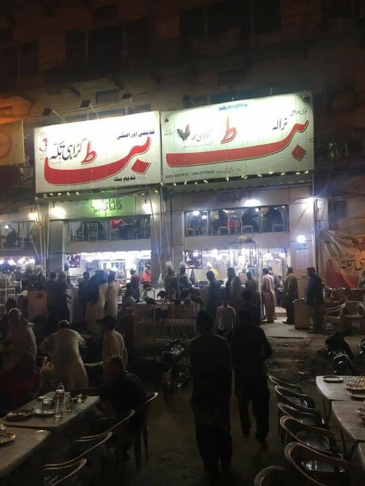 a group of people outside a restaurant